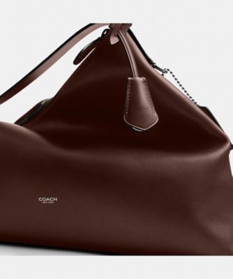 モット メッセンジャー バッグ 38 | COACH/コーチ | 三越伊勢丹